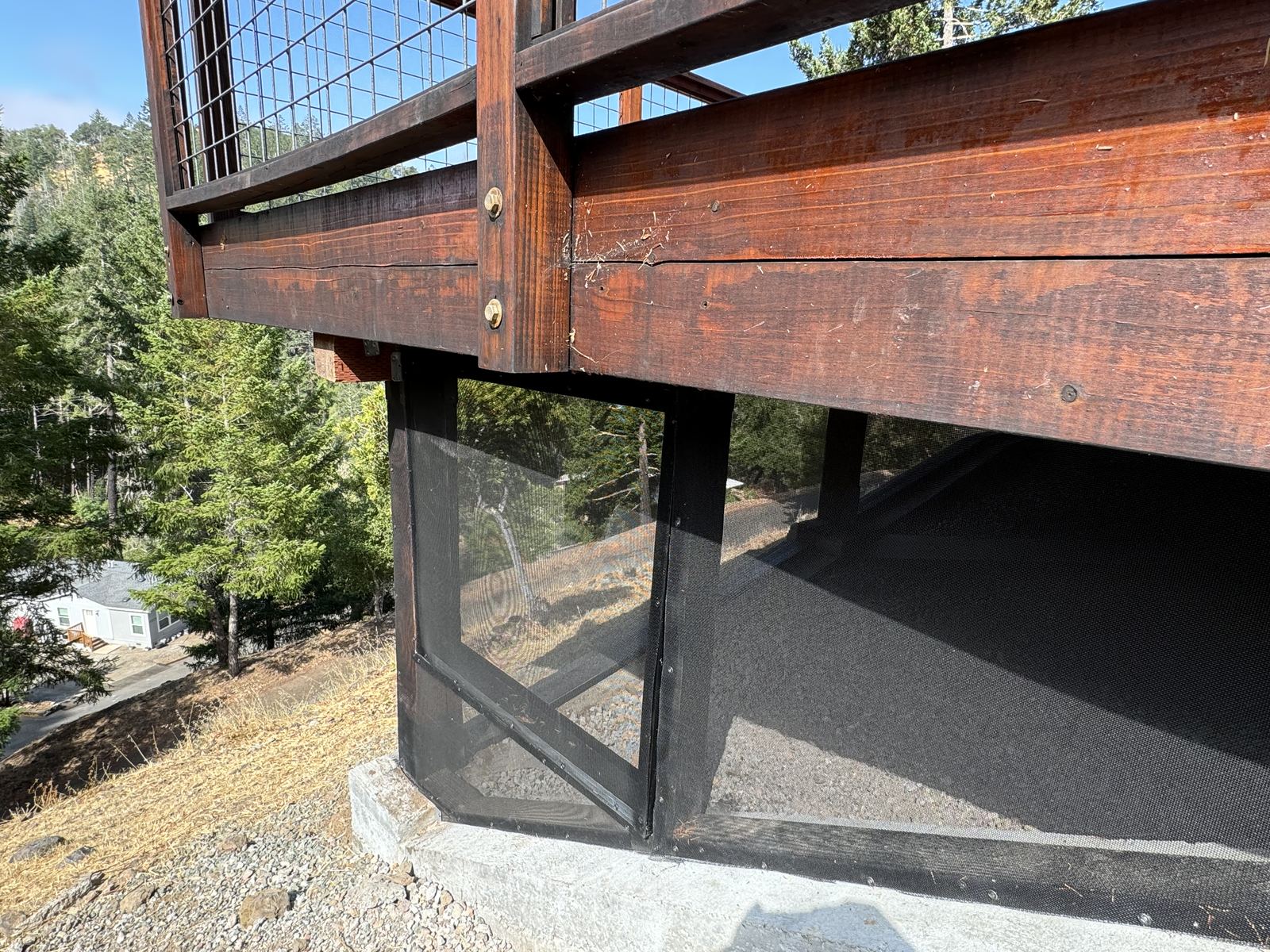 Framed fine-mesh deck skirting, the verified after condition