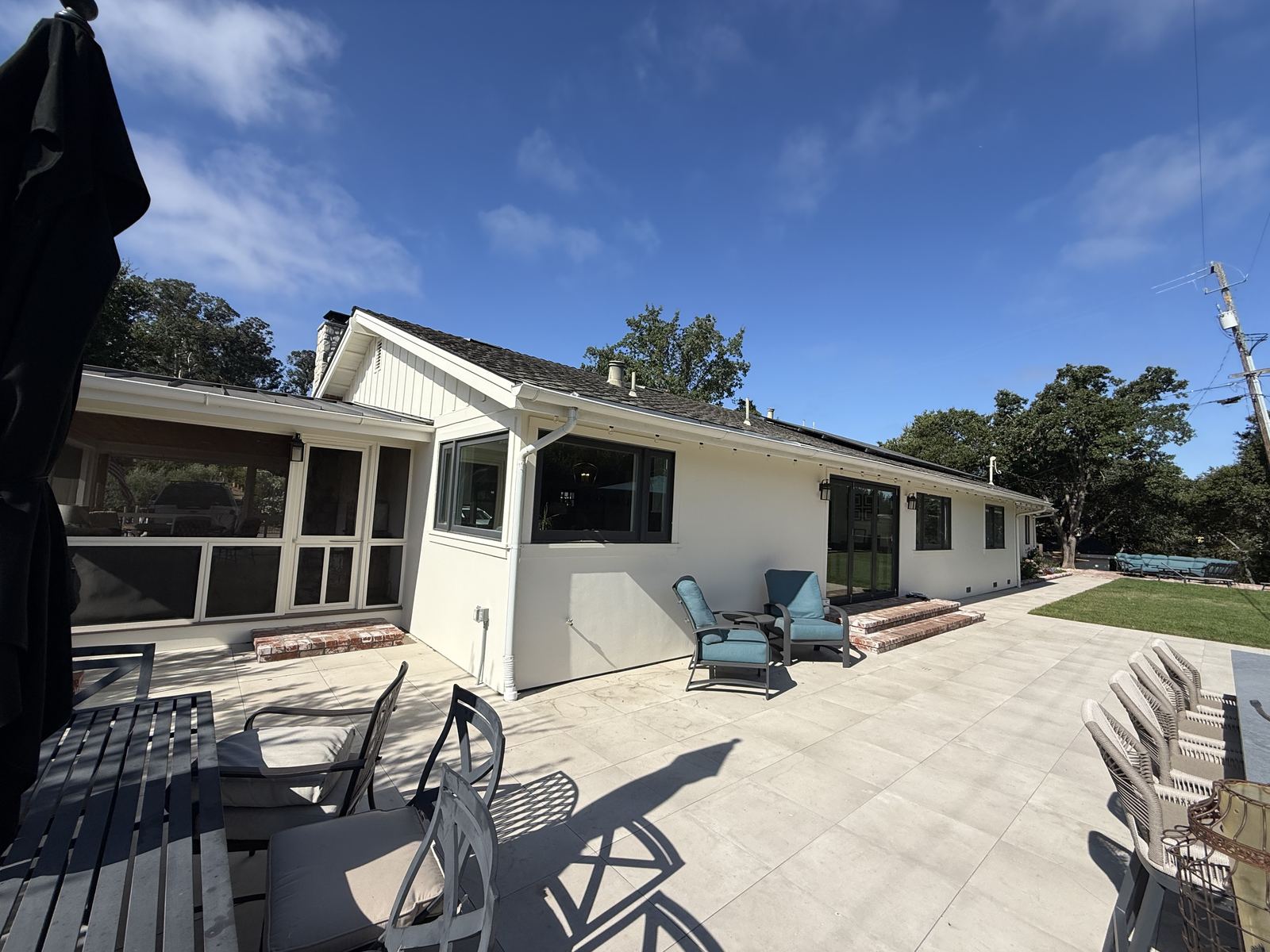 A California home with noncombustible patio hardscape, the kind of project these programs fund