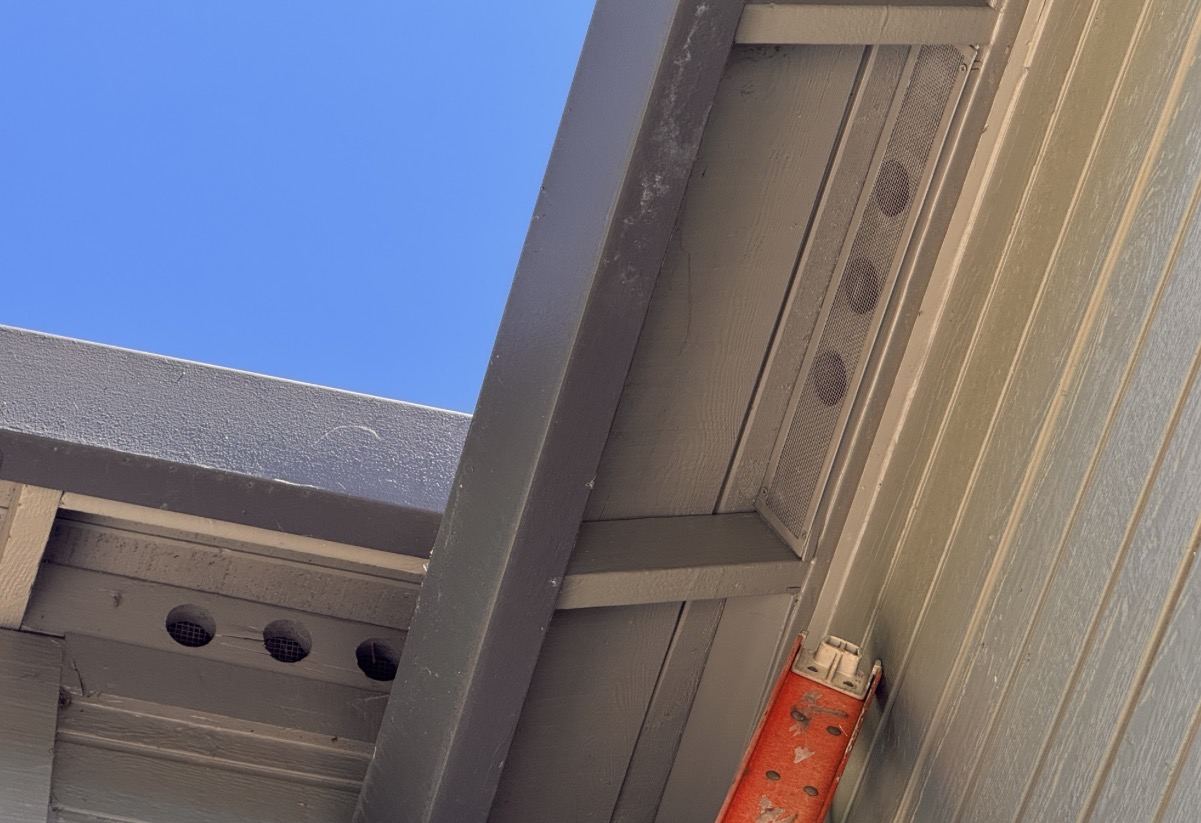 Fresh eave construction with fine mesh vents, the Safer from Wildfires standard in practice