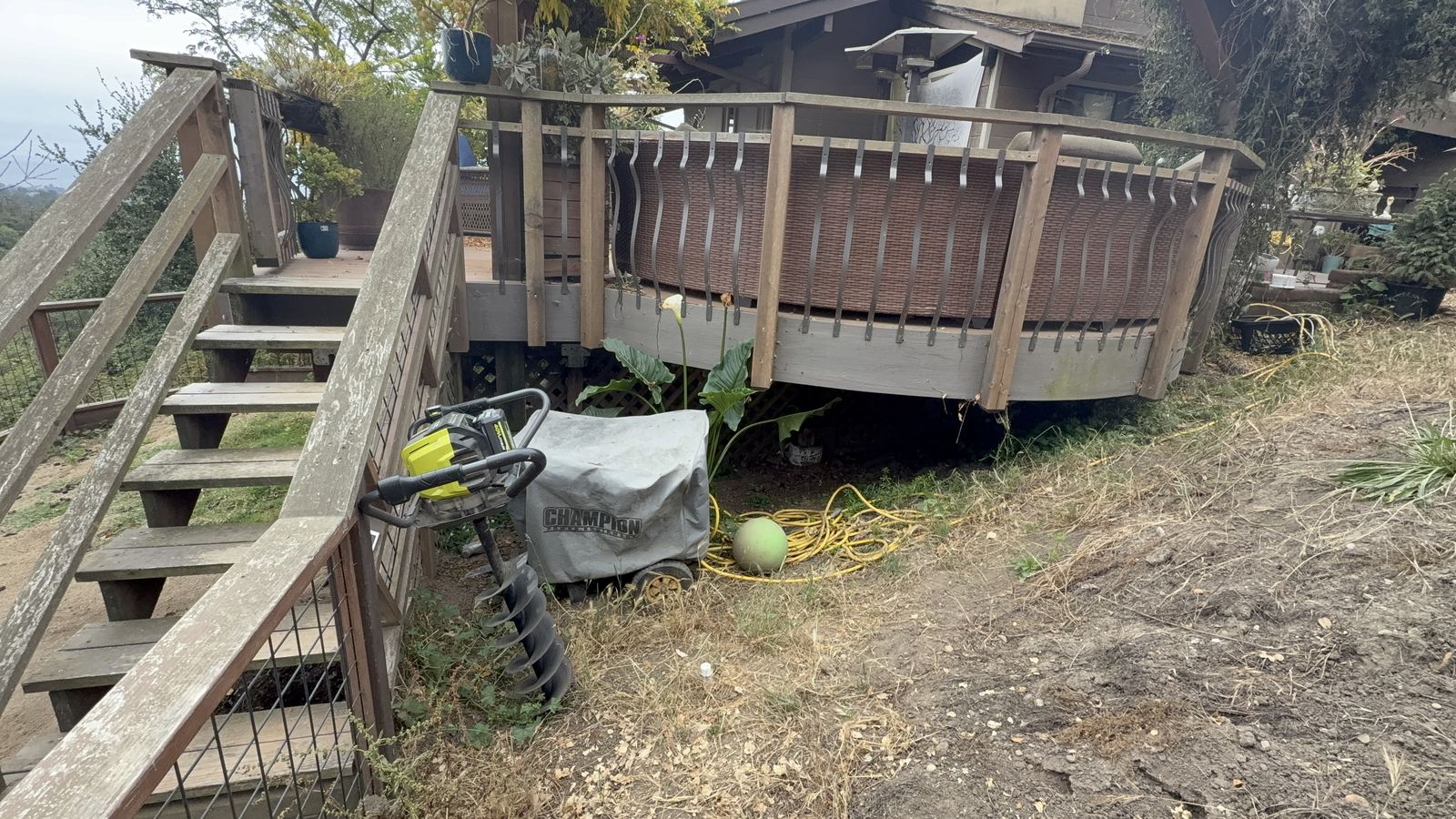 Generator and equipment stored beneath a wood deck